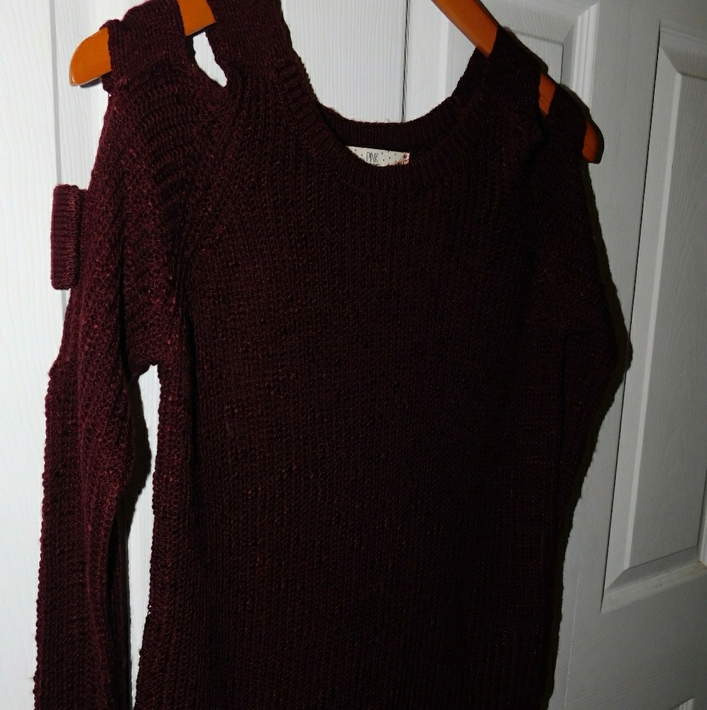 Sweater with cut out sleeves